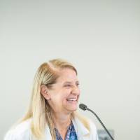 An Alumni smiling at the event.